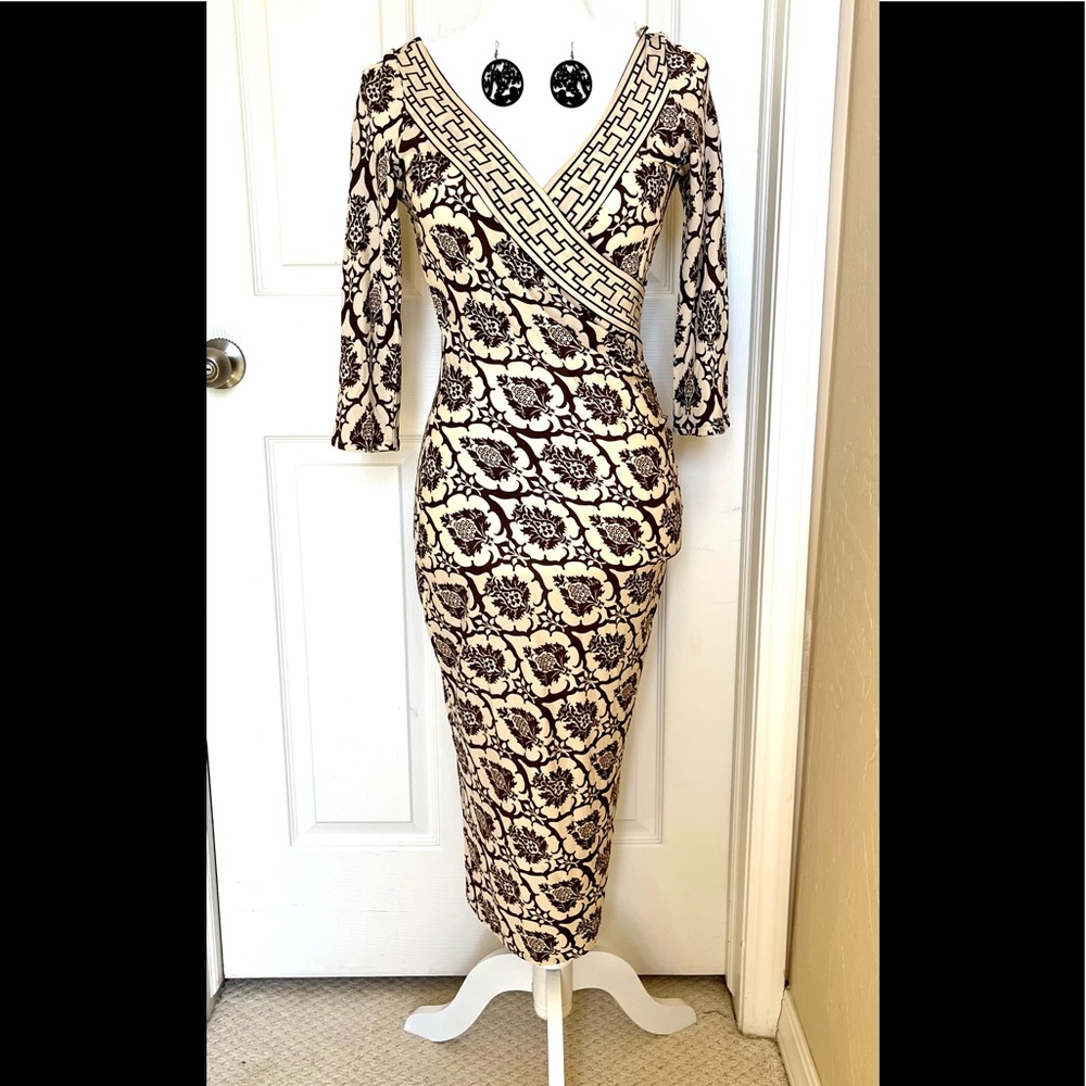 100% silk Tracy Reese, classy sexy comfortable! Free matching earrings!